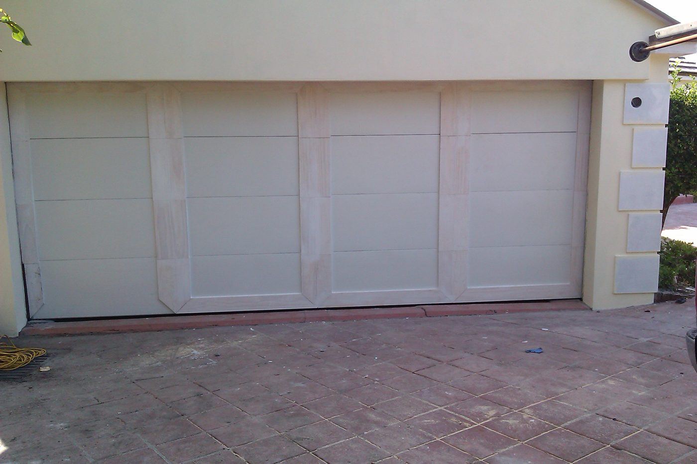 Custom garage door with wood trim detail